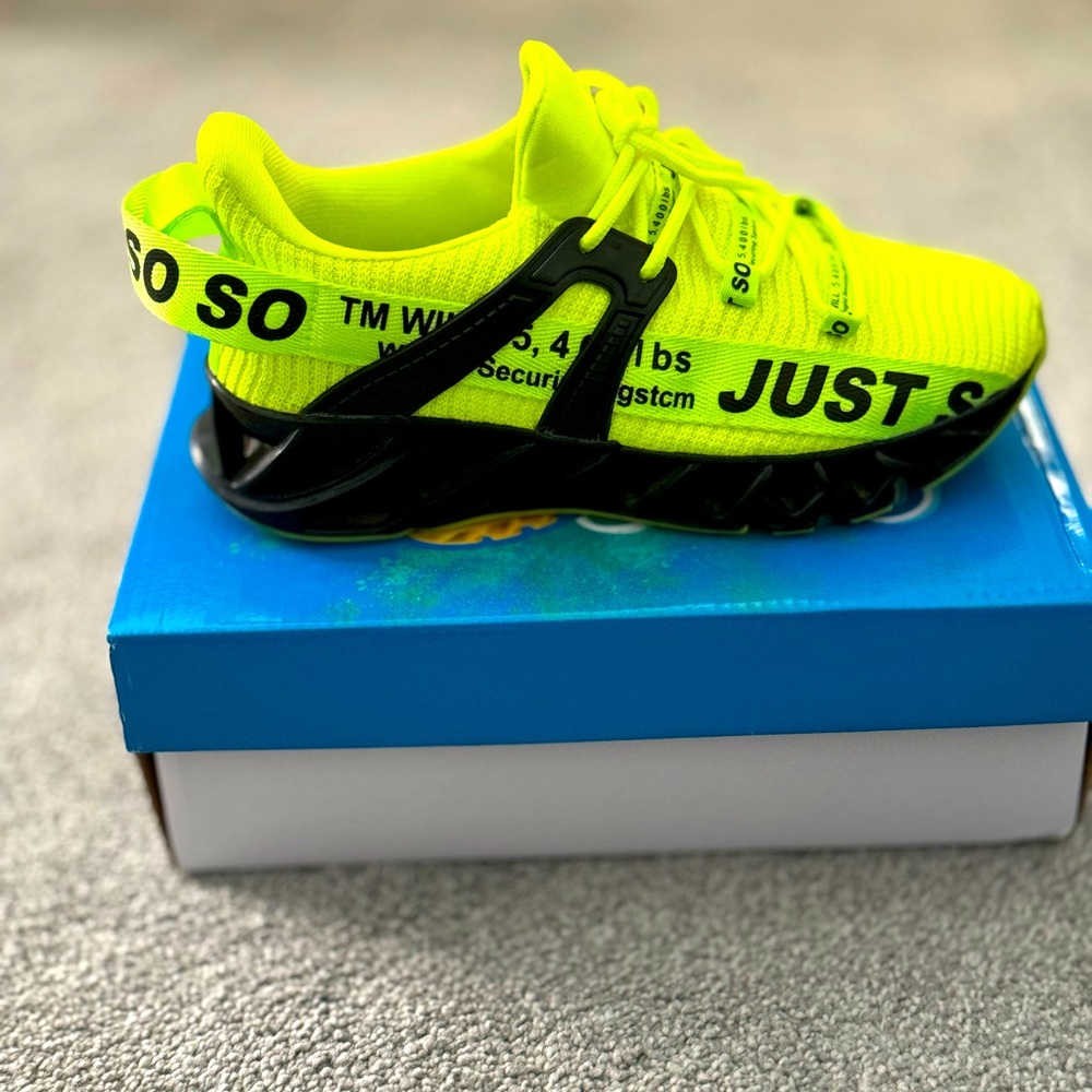 Lime green and black soso shoes
